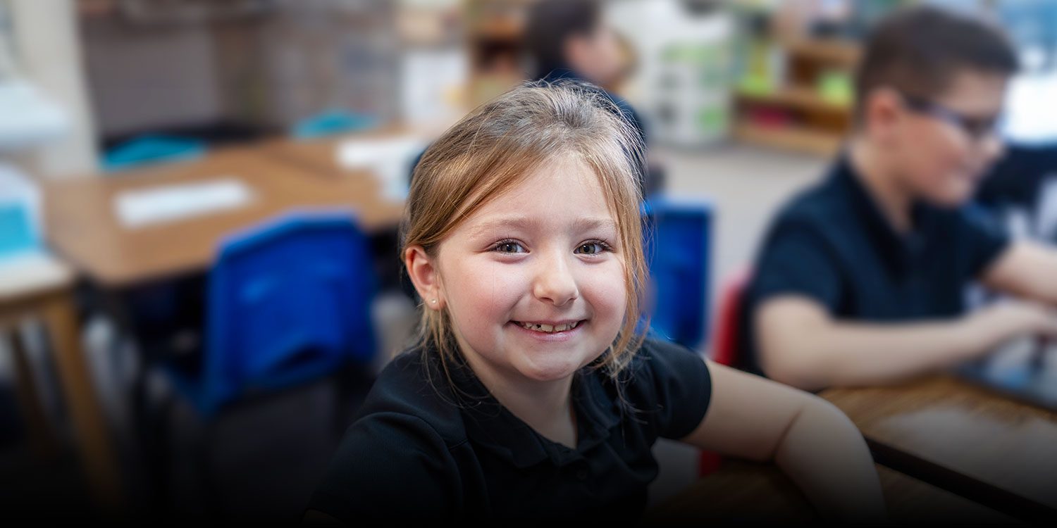 Smiling student in the classroom